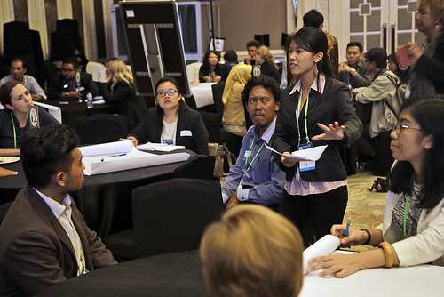 Yi Ying moderating youth group discussions during ForestsAsia
