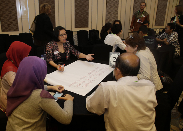 A participant leads the discussion during a special youth session at Forests Asia Summit