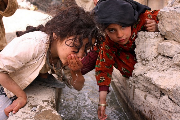 Two girls drinking water in Morocco. Photo Credit: A. Yahyaoui/CIMMYT